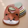 100475-a991a7.webp Adjustable Silicone Baby Bib with Crumb Catcher and Cute Bear Design