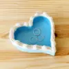 96460-c29c72.webp Heart-Shaped Resin Jewelry Organizer Tray for Rings, Necklaces, and Bracelets