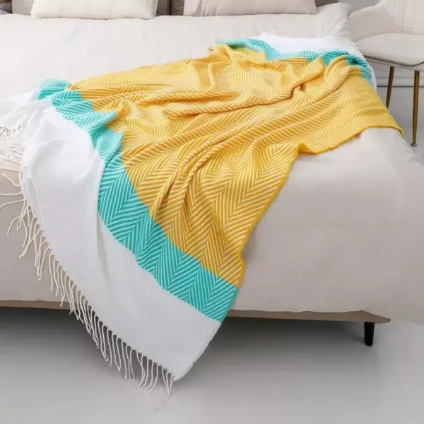 107122-df4ad3.webp Boho-Chic Striped Knitted Blanket with Tassels for Sofa and Bed Decor