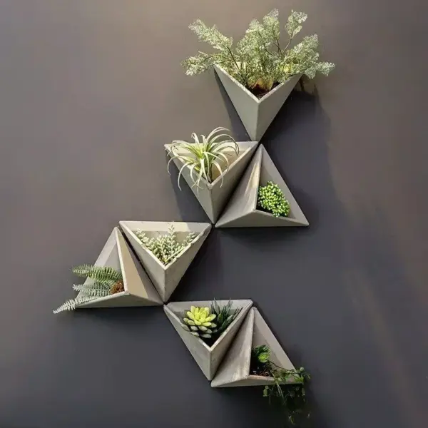 107457-efa0a0.webp Modern Nordic Triangle Wall-Mounted Cement Flowerpot